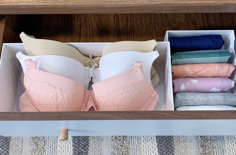 folded underwear and bras in drawer