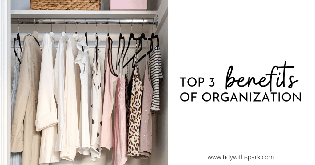 beautifully curated closet with pink and tan hues showcasing top 3 benefits of organization