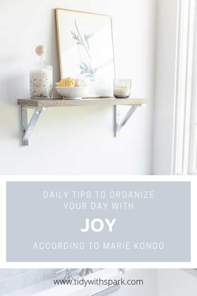 sparking joy beyond the home with Marie Kondo - Beautiful light and airy bathroom with a floating shelf and text overlay introducing tips on joy