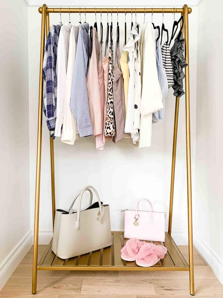 Clothes on clothing rack minimalist style