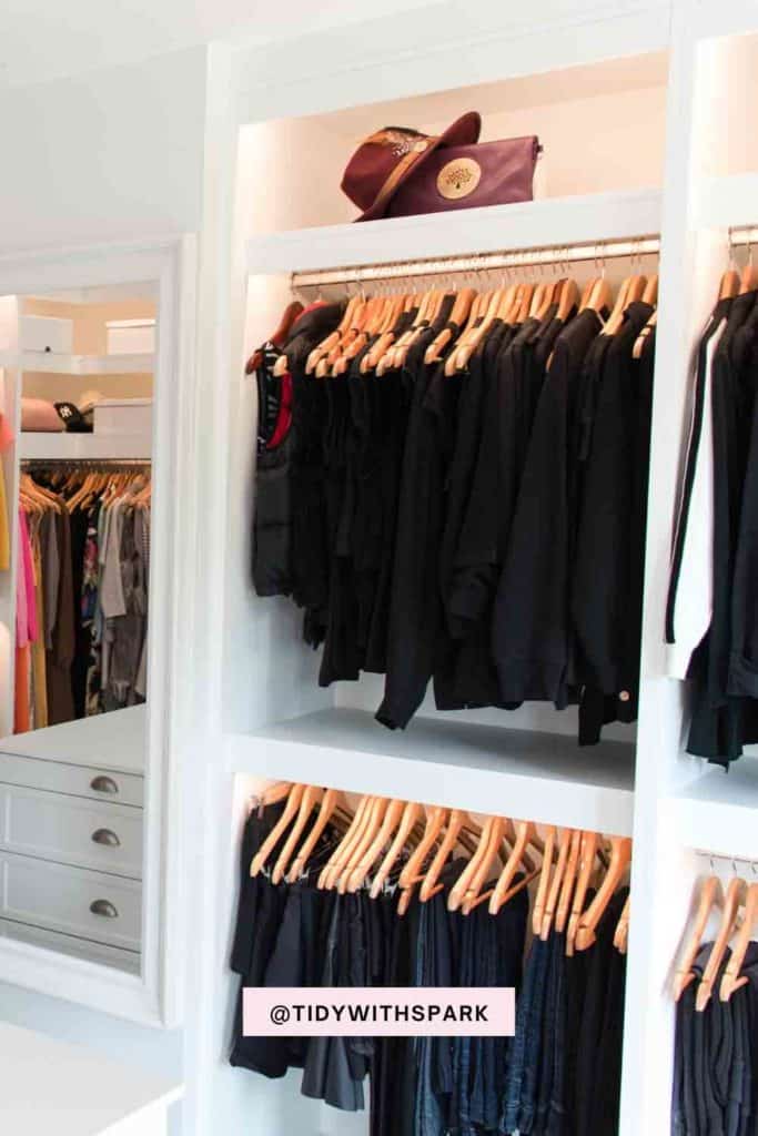 neatly hung clothes in closet