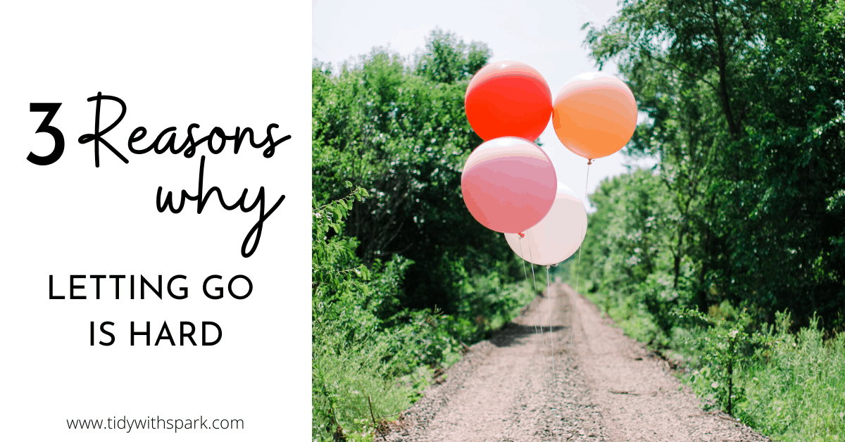 Group of balloons floating along green pathway