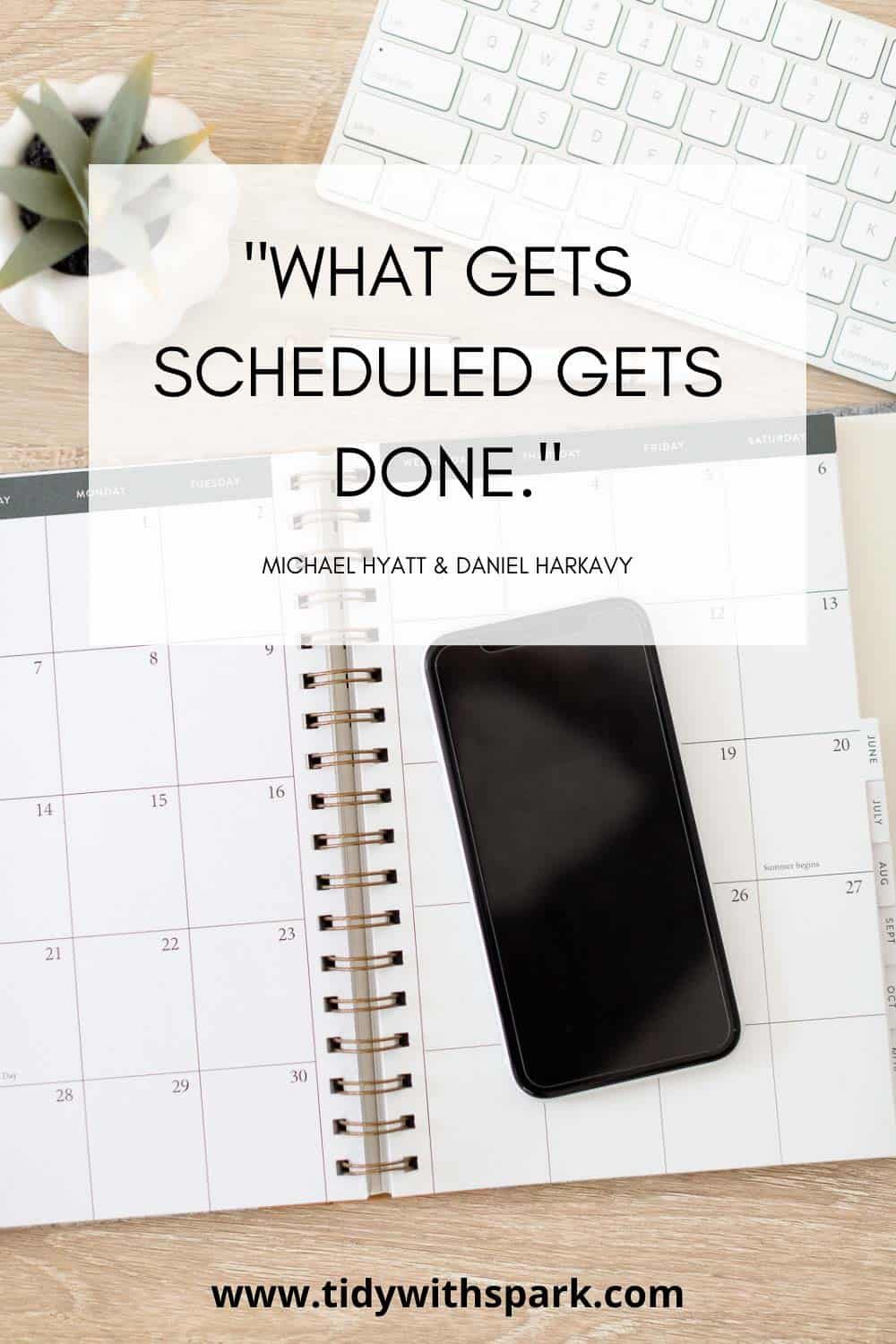 flatly of open calendar and cell phone with text overlay "what gets scheduled gets done" quote from Michael Hyatt